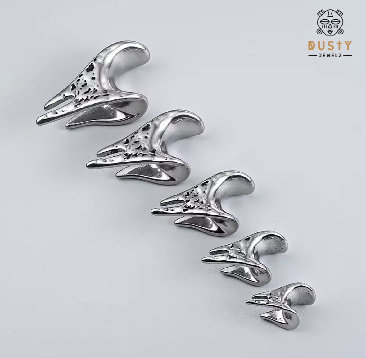 Textured Asymmetrical Triangle Saddle Spreader Plugs