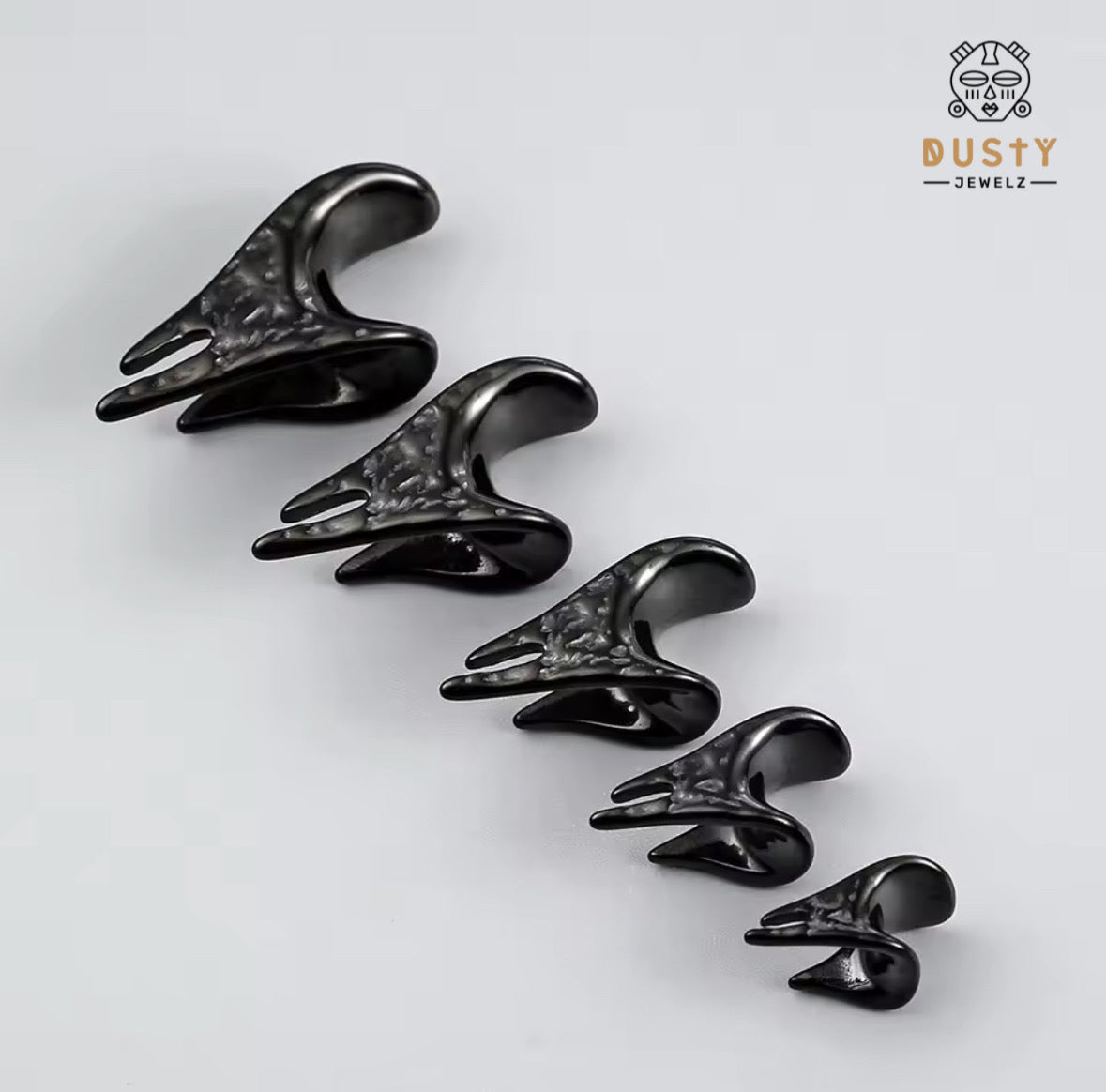 Textured Asymmetrical Triangle Saddle Spreader Plugs